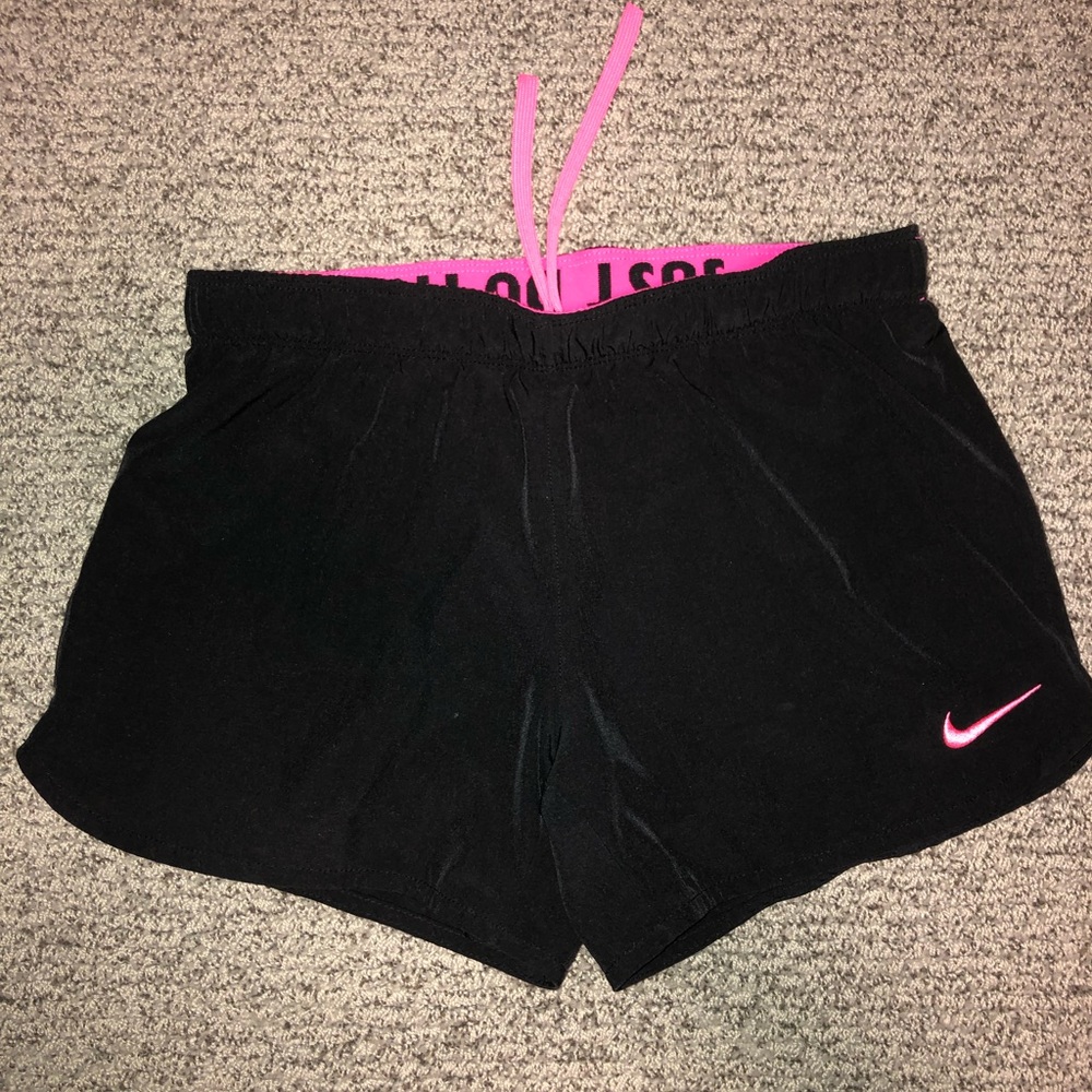 black and pink nike shorts